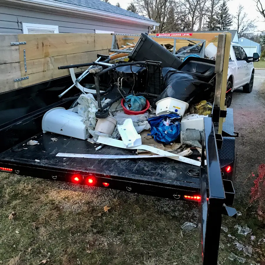 Roll-off dumpster delivered to a residential driveway in Bonadelle Ranchos